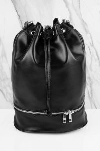 tobi.com - black faux leather bucket bag style backpack