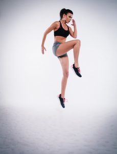 shutterstock - fitness woman jumping