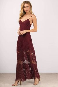 Tobi.com - She's foxy in the Wanderlust Lace Maxi Dress. Dressed to kill in this open back maxi dress featuring romantic lace overlay, adjustable thin straps and scalloped hem. On the edgy side of things, this open back maxi dress that would look great for special evenings and proms.