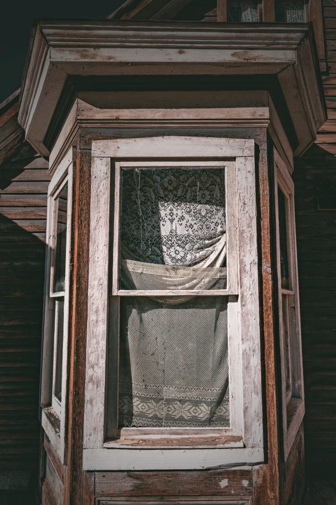 creepypasta haunted window by byron johnson on unsplash.com