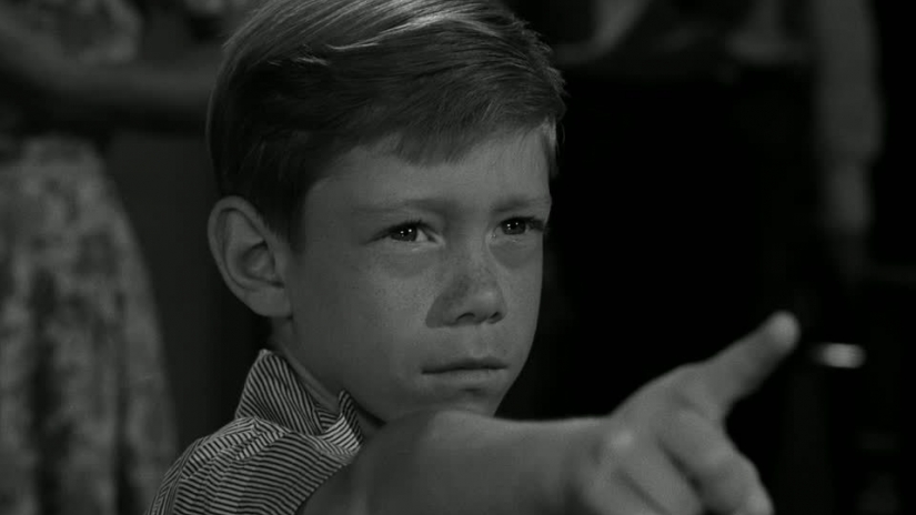 twilight zone show, young boy pointing finger, black & white 
