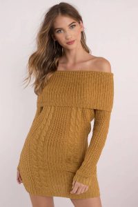 You'll love our Natasha Off Shoulder Sweater Dress. Featuring knitted fabrications and off shoulder silhouette. Pair with thigh high boots.