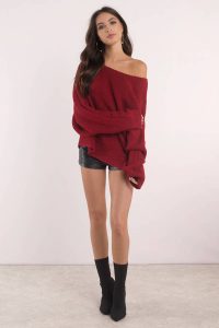 Keep it comfy and cozy in the Time Will Tell Asymmetrical Sweater. Featuring an asymmetrical body. Pair this sweater with high waisted denim jeans and booties.