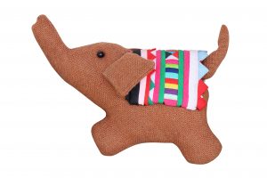 plush brown elephant with colorful blanket