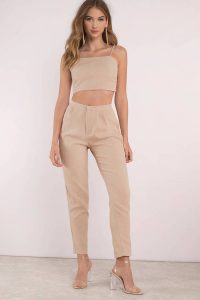 Stay on trend while looking put together with our Madelyn Jumpsuit Set. Featuring crop top and matching bottoms. Pair with your favorite heels and a moto jacket.
