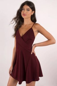 The Into You Skater Dress has a classic skater dress silhouette featuring front surplice detail.