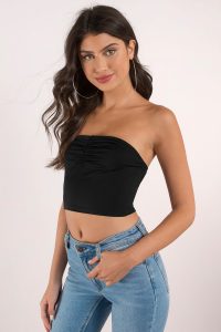 Never met a crop top we didn't like in the Britt Strapless Crop Top. An everyday crop top you need in your life featuring a fitted strapless bodice with ruche detail along the chest. No lies, this goes with everything.