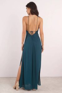 Drop low with the Naomi Low Back Maxi Dress. Featuring all over satin and a low back. Style with heels.