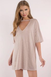 Casual AF in the Taupe Bailey Choker Tee Dress. An oversized t shirt dress we're infatuated with featuring a choker dress detail, casual fit, and wide cap sleeves. Easy to dress up with your usual basics with high heels or stay comfy and stylin' AF with a pair of dope sneakers.