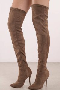 Add some edge to your fall wardrobe with these faux suede thigh high boots. Featuring a pointed toe and a skinny stiletto heel. Pair with high waisted dark denim and a crop top.