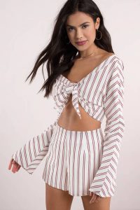 Shop the NOELLE WHITE MULTI FRONT TIE STRIPED CROP TOP at tobi.com!