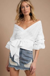 LIONESS CHARMED BY YOU WHITE WRAP TOP at tobi.com!