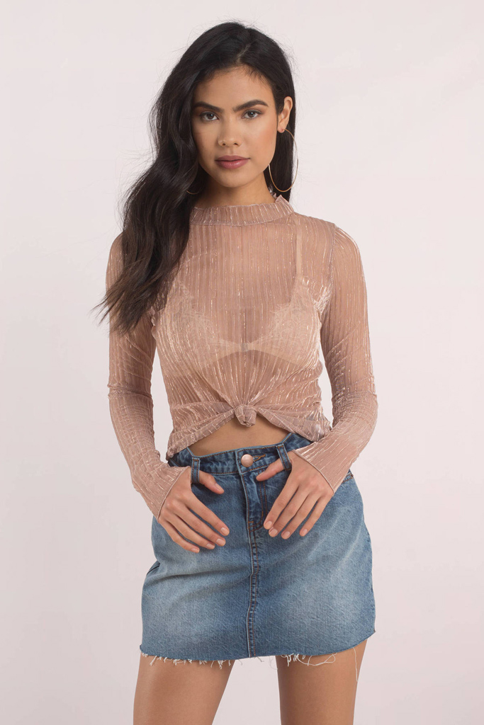 A see through pink mesh top to combat the warm temperature of spring