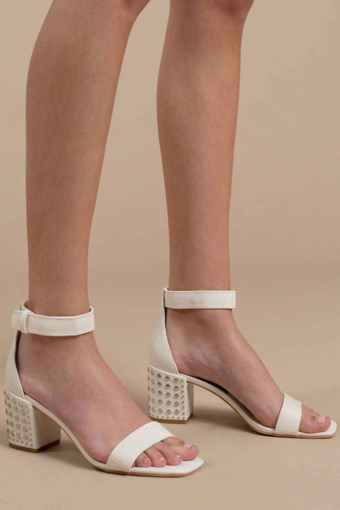 White studded suede heels