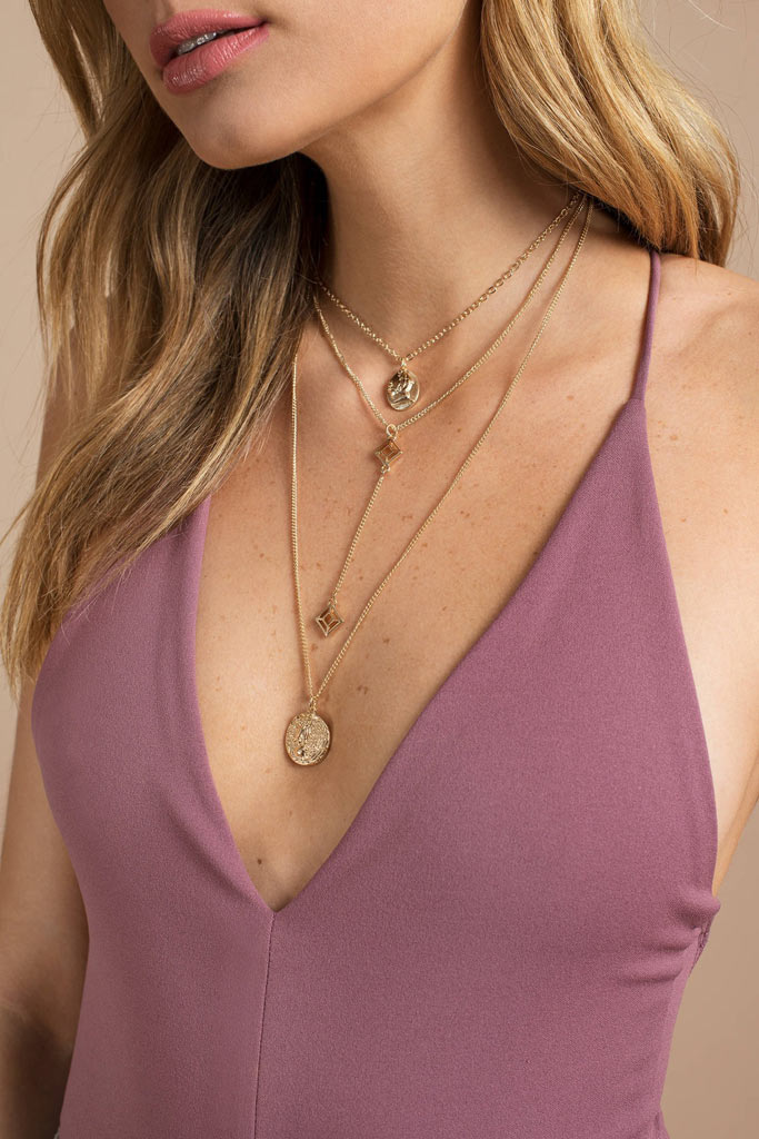 A gold layered necklace for summer
